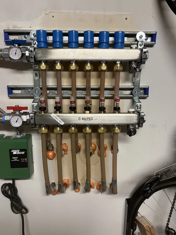 Plumber performing Gas Leak Detection at a residential property in Lynbrook