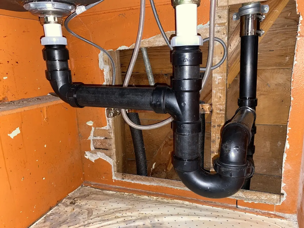 Professional Garbage Disposal Repair equipment and tools on the job in Lynbrook